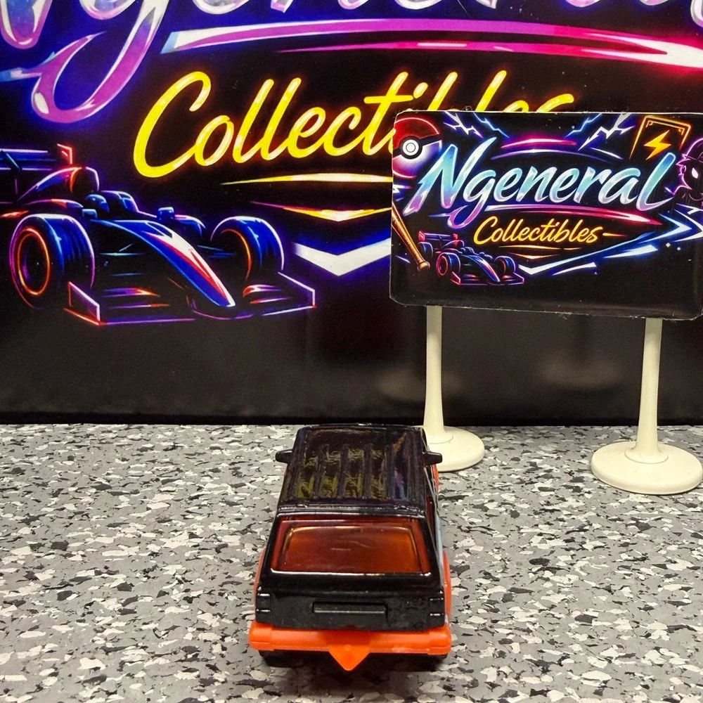 Matchbox Jeep Cherokee MB163 Black Orange Comic Graphics Diecast SUV 1:64 Scale
